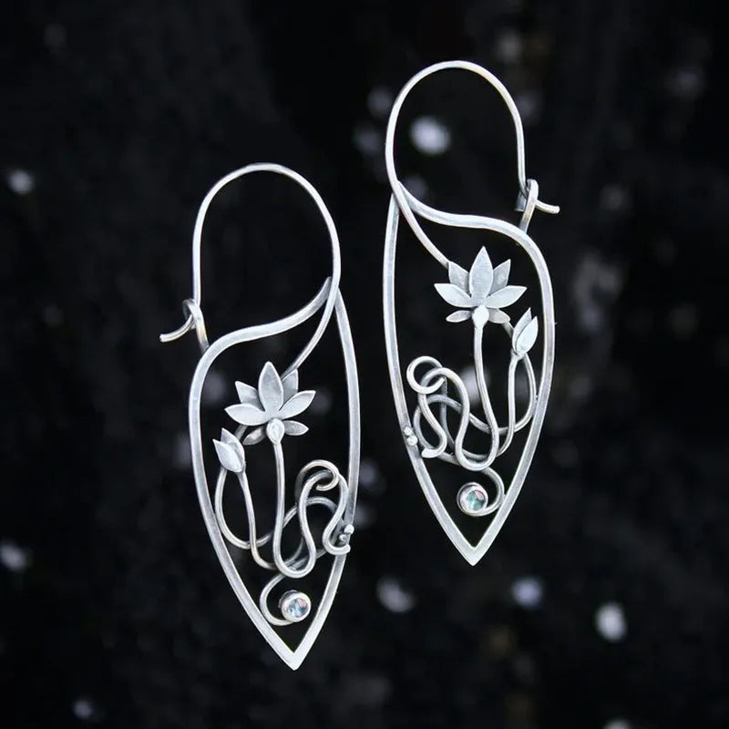 Silver lotus vine and geometric shape drop earrings with rhinestone accents