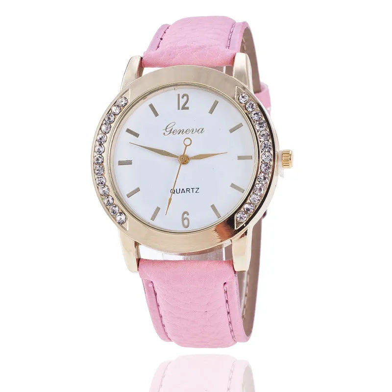 Geneva women's quartz watch with blue dial, round alloy case, and imitation leather strap on display