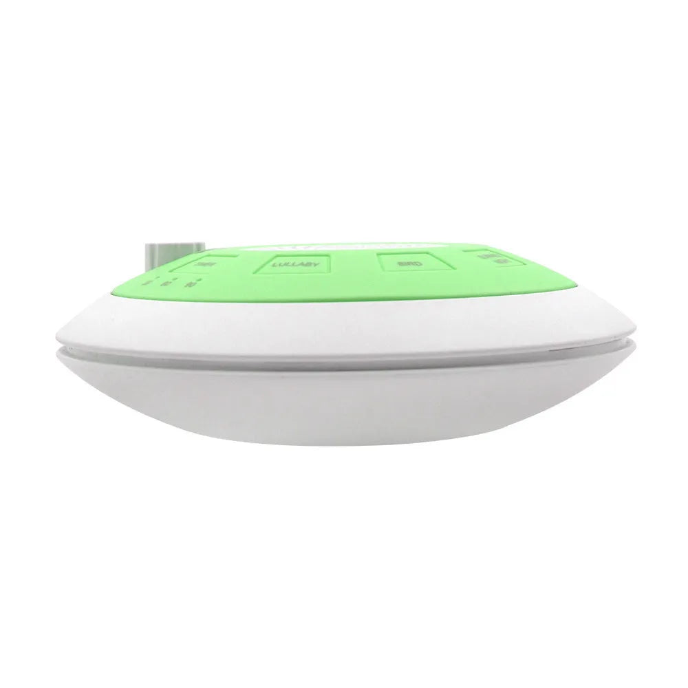 Rechargeable white noise sleep aid instrument in blue or green flying saucer design with music function