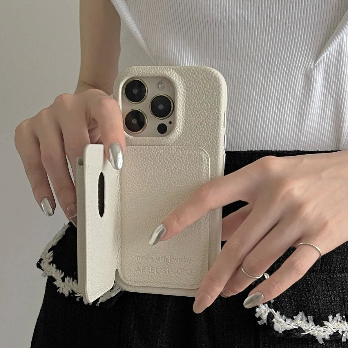 Beige genuine leather phone case with litchi texture for iPhone models 12 to 15 series