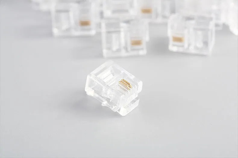 White Category 6 RJ45 crystal plug in canned pack with 100 pieces, injection moulded