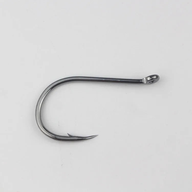 Barbed fishing hooks in various sizes from small to large on a blue background