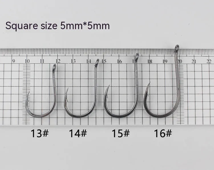 Barbed fishing hooks in various sizes from small to large on a blue background