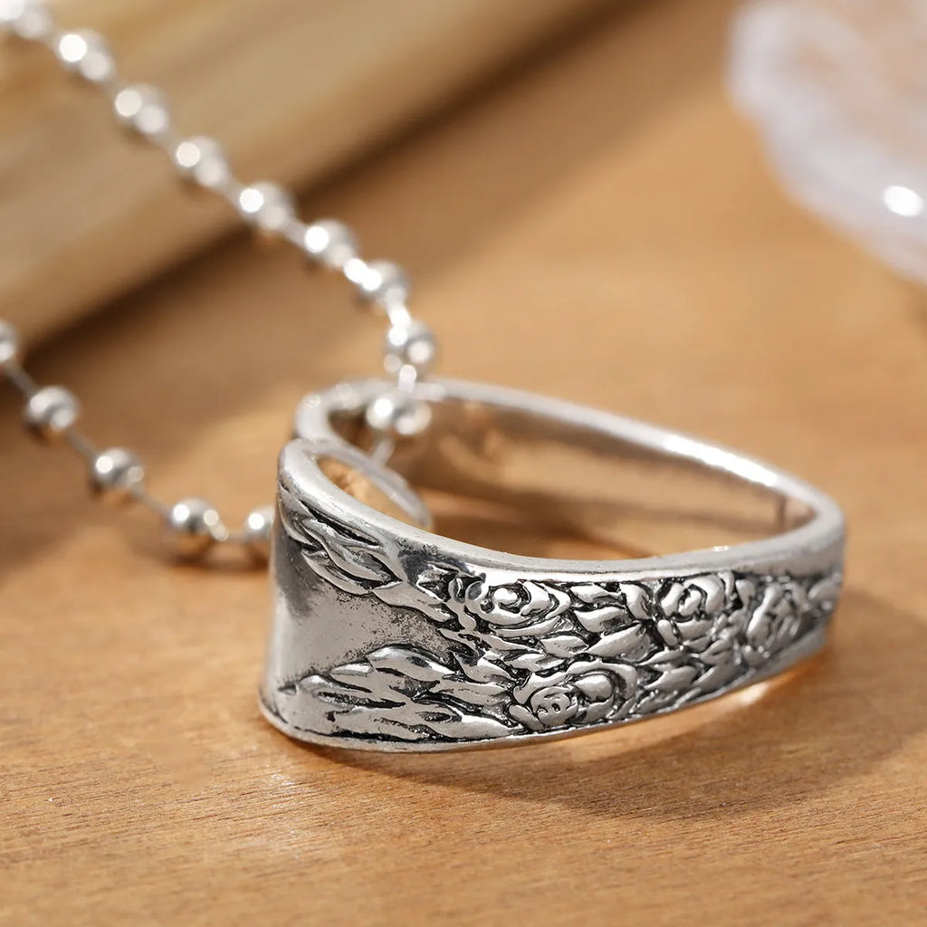 Silver alloy heart-shaped pendant necklace with letter and number text details for women