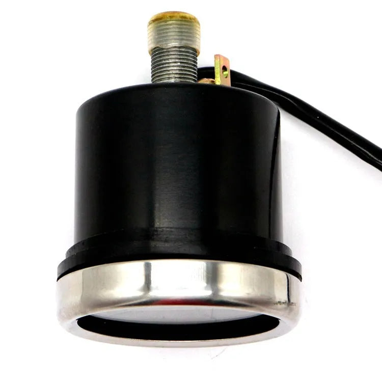 Black round motorcycle mechanical speedometer with dual kilometer and mile scales, 61.5mm diameter, 12V