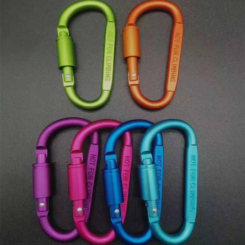 Aluminium D-shaped carabiner with lock shown in multiple colour options including black, silver, red, and blue.