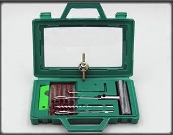 Car tyre repair kit with rubber strips, drill pin, solid handle, wrenches and storage box