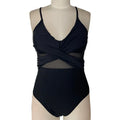 Women's mesh spliced backless one-piece swimsuit in black with polyester lining, size S to 2XL