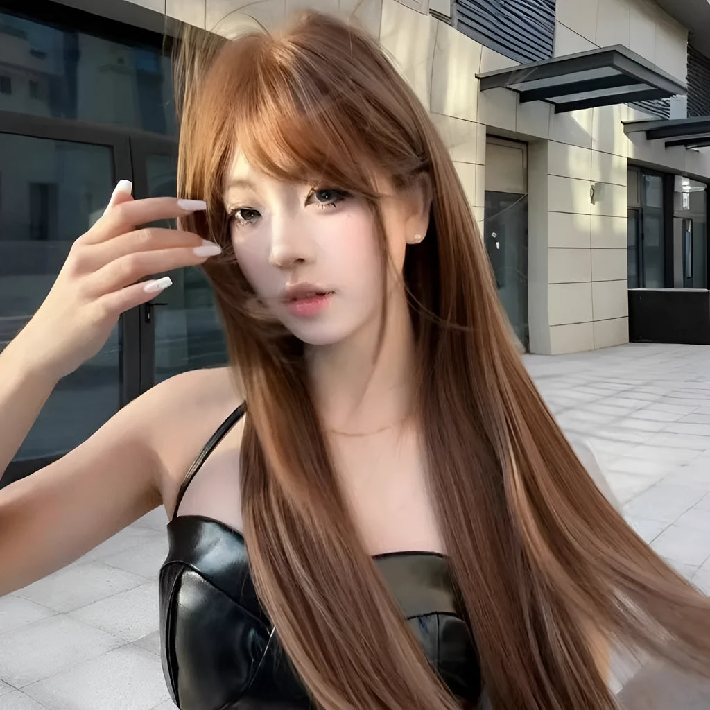 Warm brown long straight synthetic wig with fringe on a model