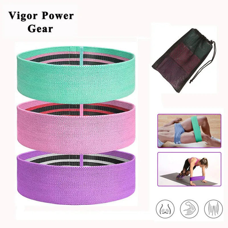 Squat resistance band hip ring in green, pink, or purple, made from latex silk and polyester webbing
