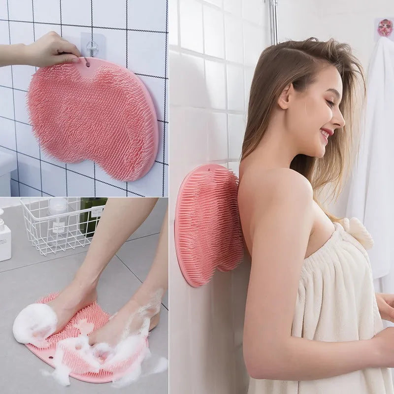 Orange non-slip TPR bath mat with silicone bristles for foot massage and cleaning.