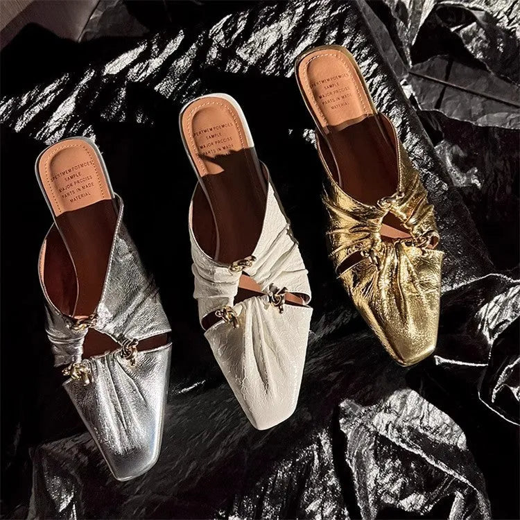 Women's gold genuine leather half toe cap slippers with low heel and square toe on a white background.