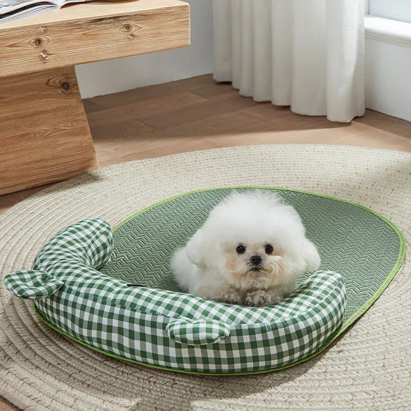 Large green pet cooling mat for dogs and cats, size 75 cm by 55 cm, placed on a floor.