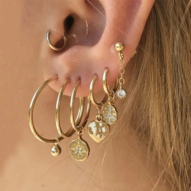 Round metal earrings with electroplated finish, unisex style, available in 14 variant codes IPA0224 to IPA0237