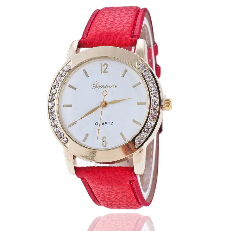 Geneva women's quartz watch with blue dial, round alloy case, and imitation leather strap on display