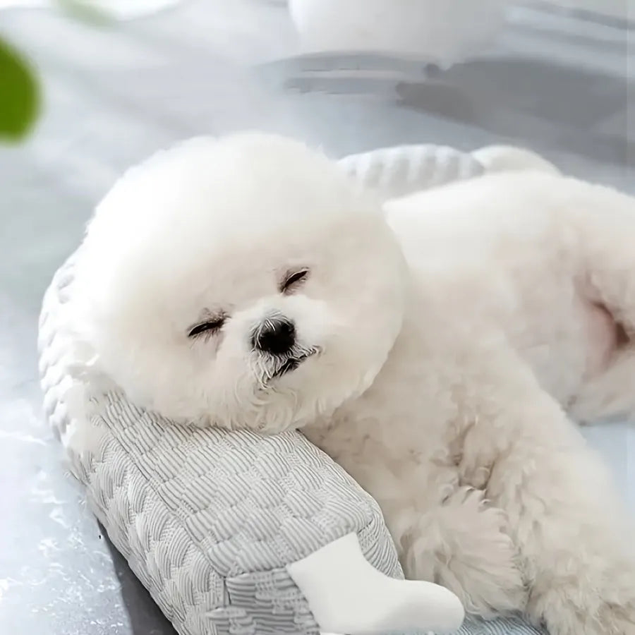 Blue pet bed with monster design showing breathable polyester fabric and non-slip base