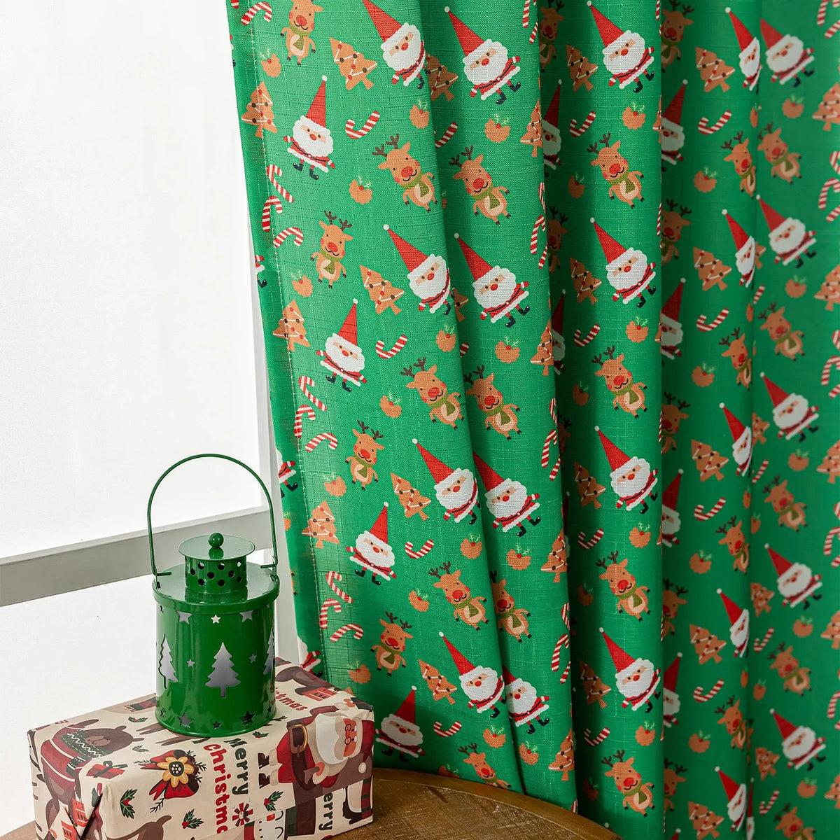Green Christmas curtain with printed snowman and angel cartoon pattern