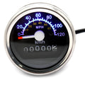 Black round motorcycle mechanical speedometer with dual kilometer and mile scales, 61.5mm diameter, 12V
