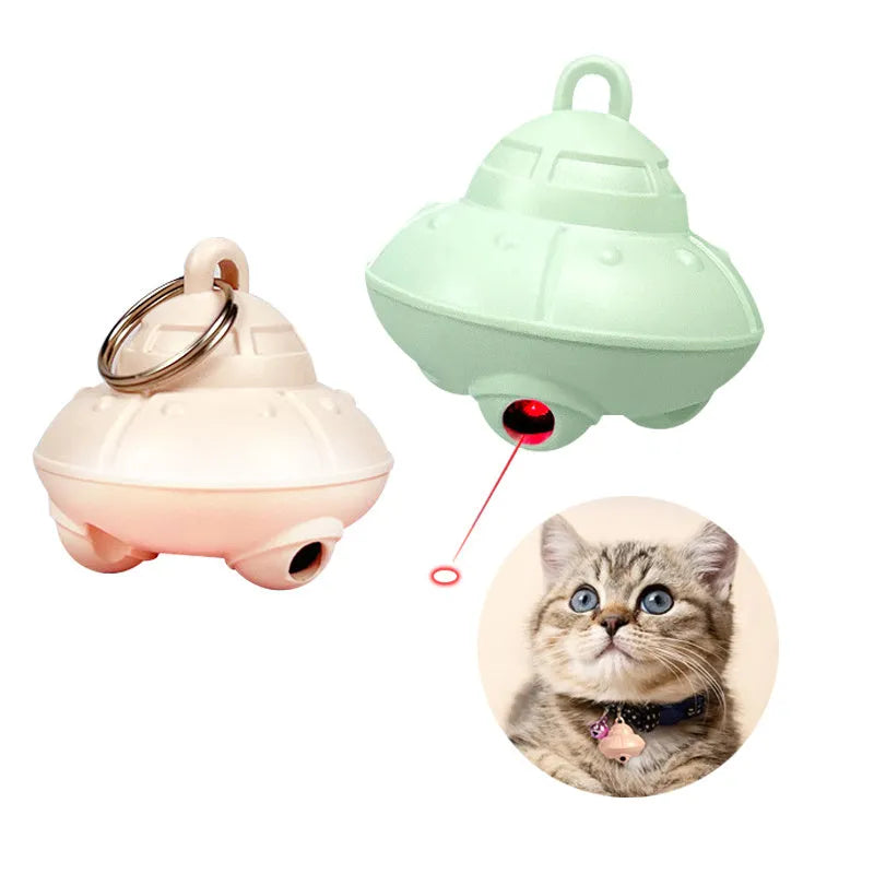 Green cat collar laser toy with USB charging and 360° rotation on a pink cat collar