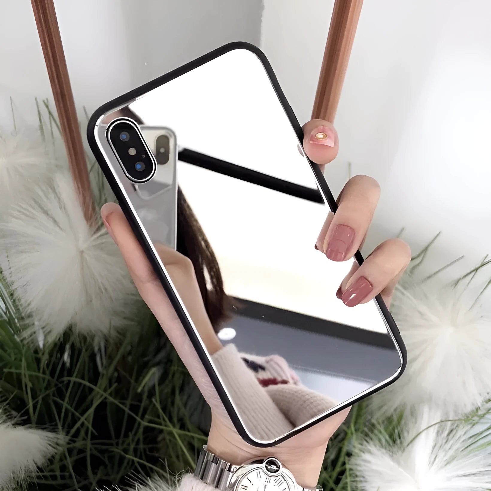 Black iPhone mirror phone case showing reflective surface, compatible with iPhone X and 7/8 Plus models.