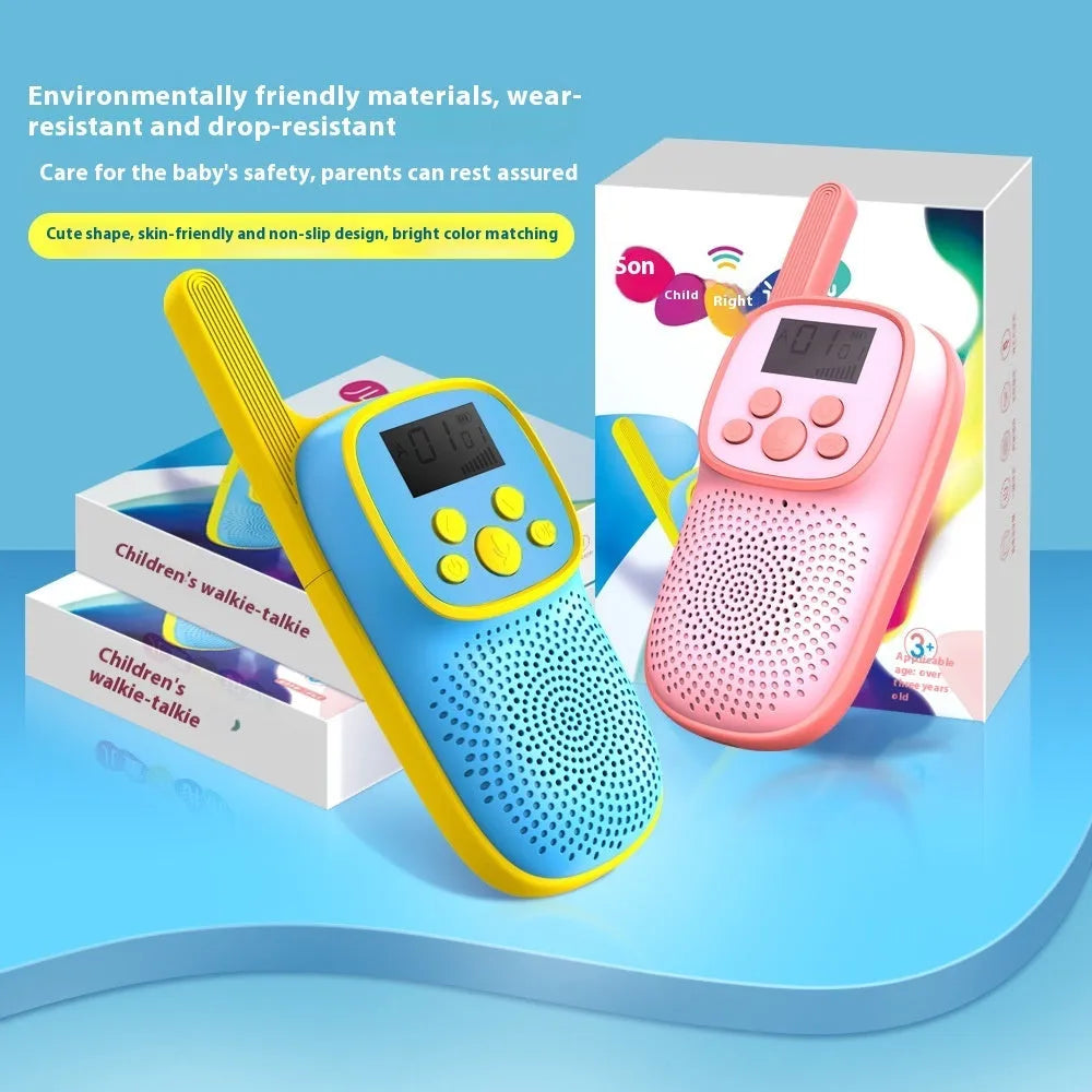 Wireless cartoon children's walkie-talkie toy pair in pink and blue with non-slip grip, hanging ropes, and packaging box