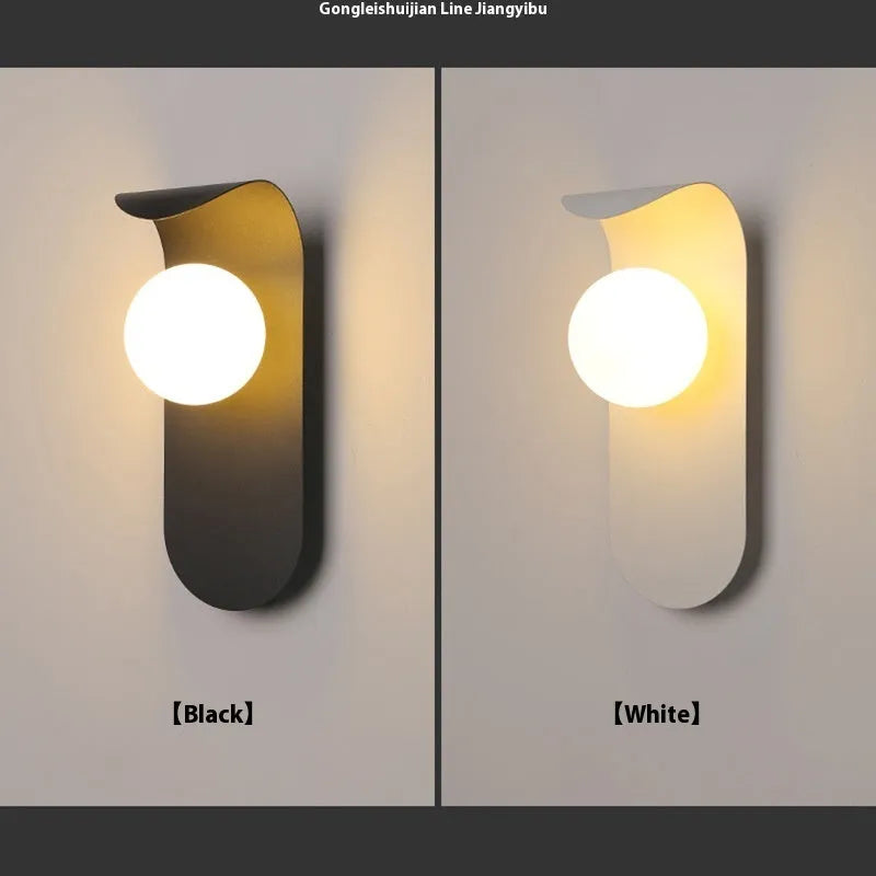 Modern minimalist black iron wall lamp with LED light for bedside or living room wall