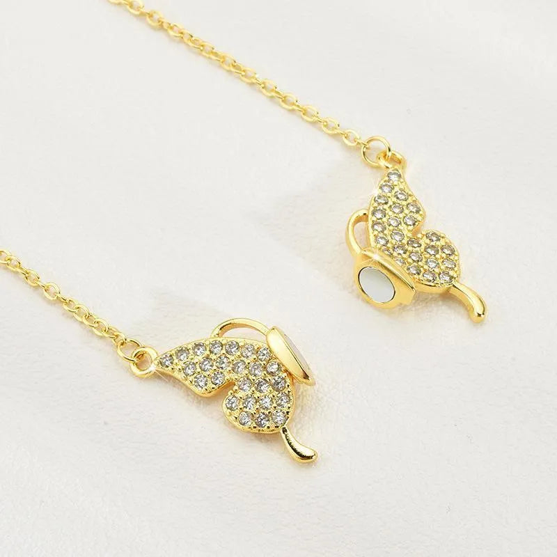 Gold titanium steel twisted chain necklace with magnetic butterfly clasp.