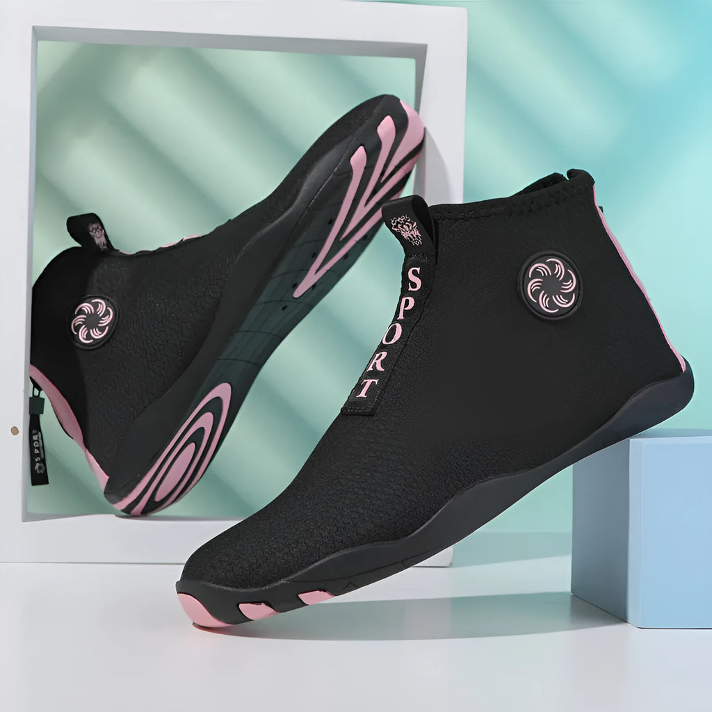 Mid-top breathable mesh beach water shoes in black and fluorescent green with a textured non-slip rubber sole.