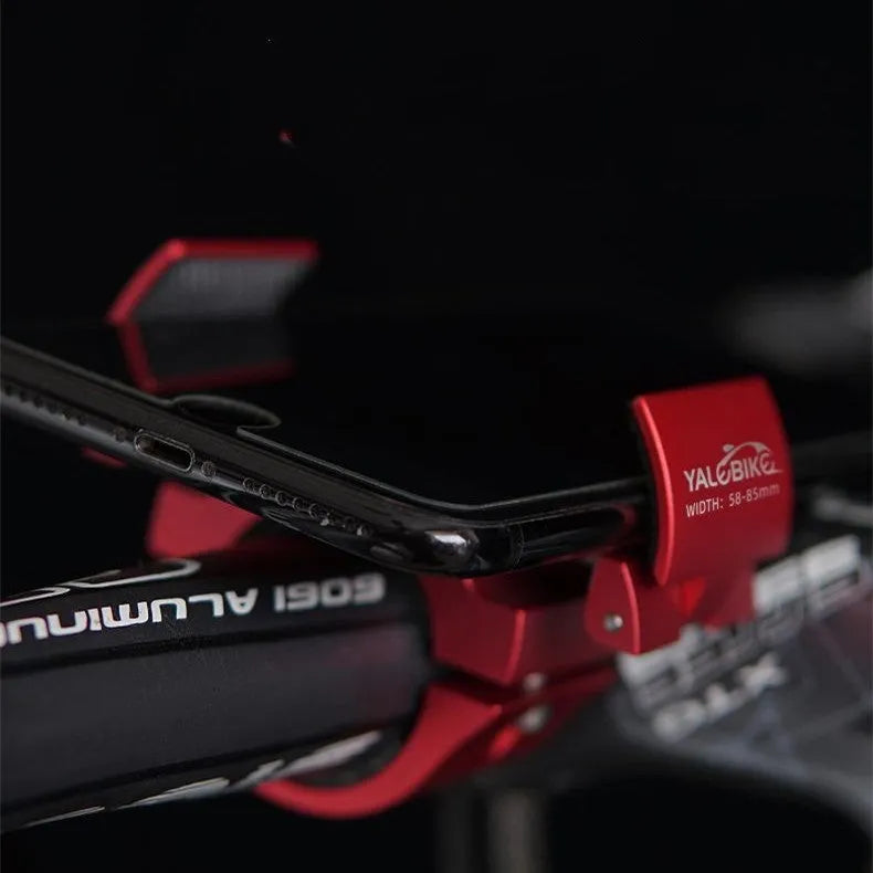Folding bike phone mount in black, red, or silver, aluminium alloy with silicone sheets, one-hand operation, ring design