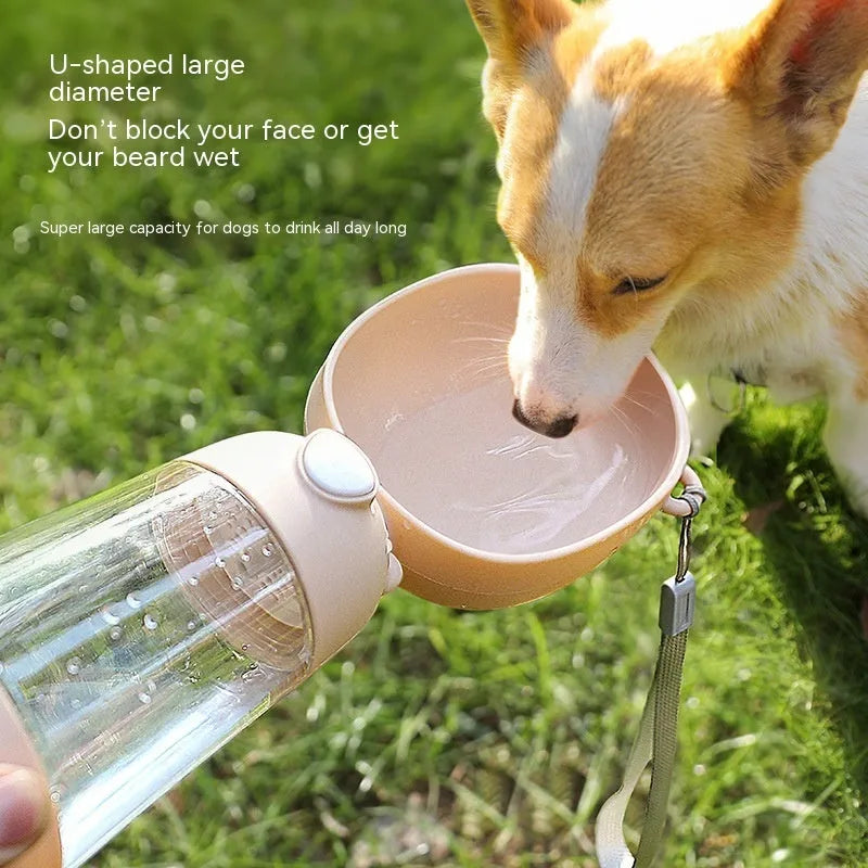 Portable dog water bottle and food container in yellow, pink, or brown colours for outdoor travel.