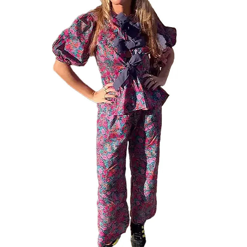 Women's floral print leisure suit set with tie-neck blouse and matching trousers