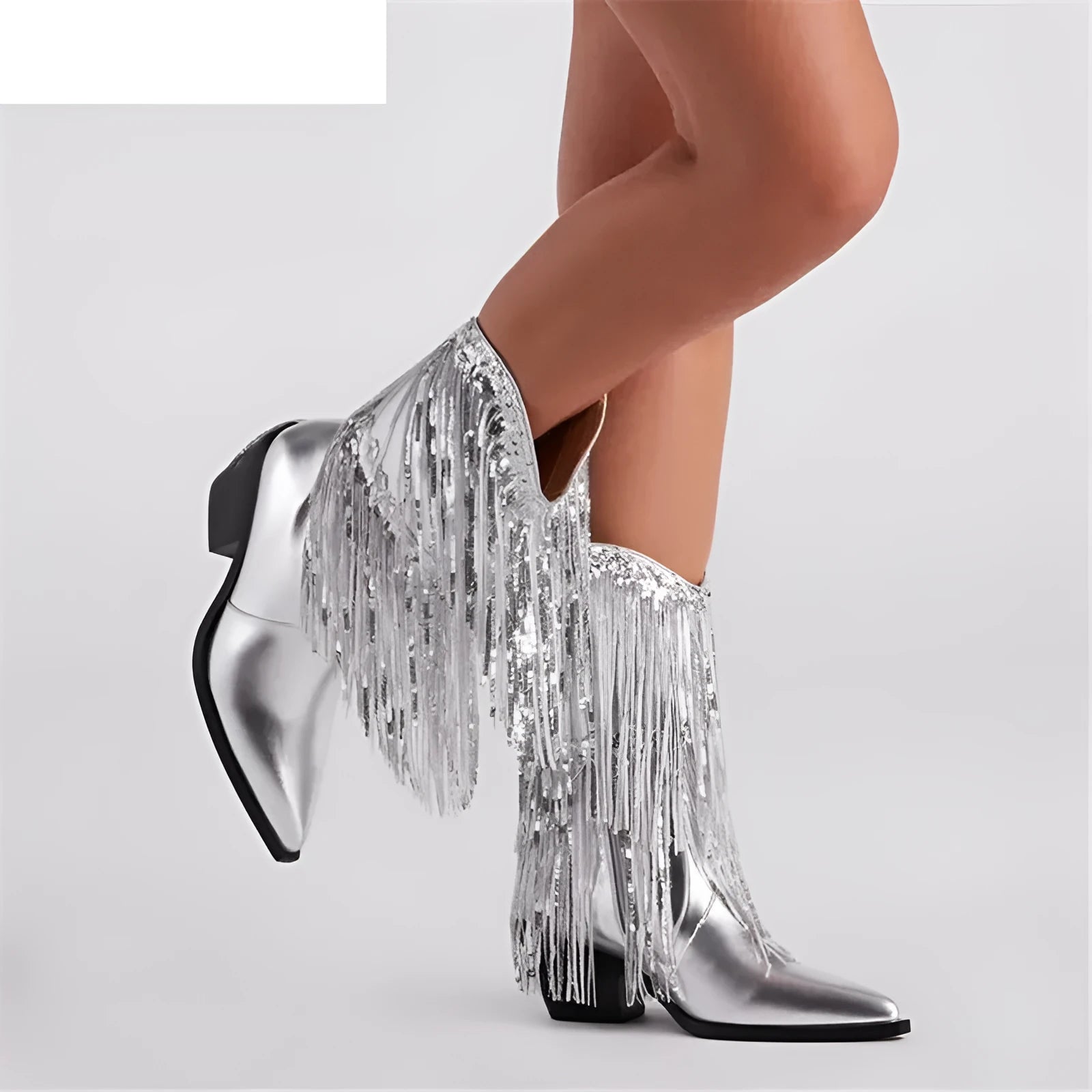 Women's brown chunky heel ankle boots with tassel detail and a high stiletto heel.