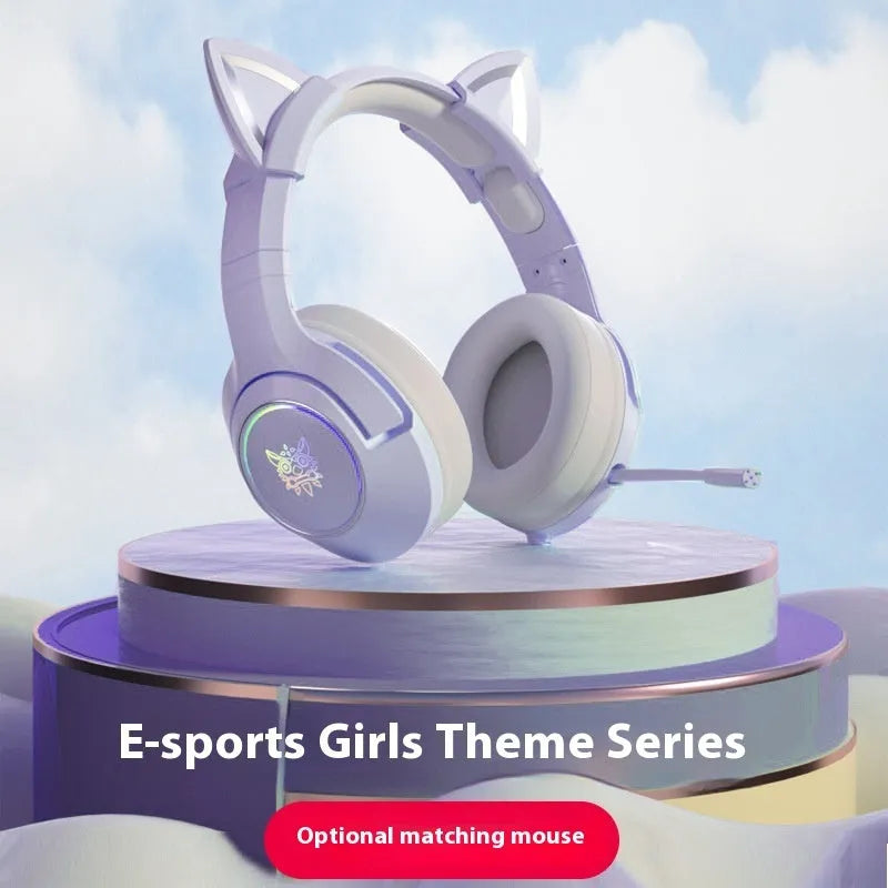 Purple and white mechanical keyboard and mouse set with matching headphones on desk