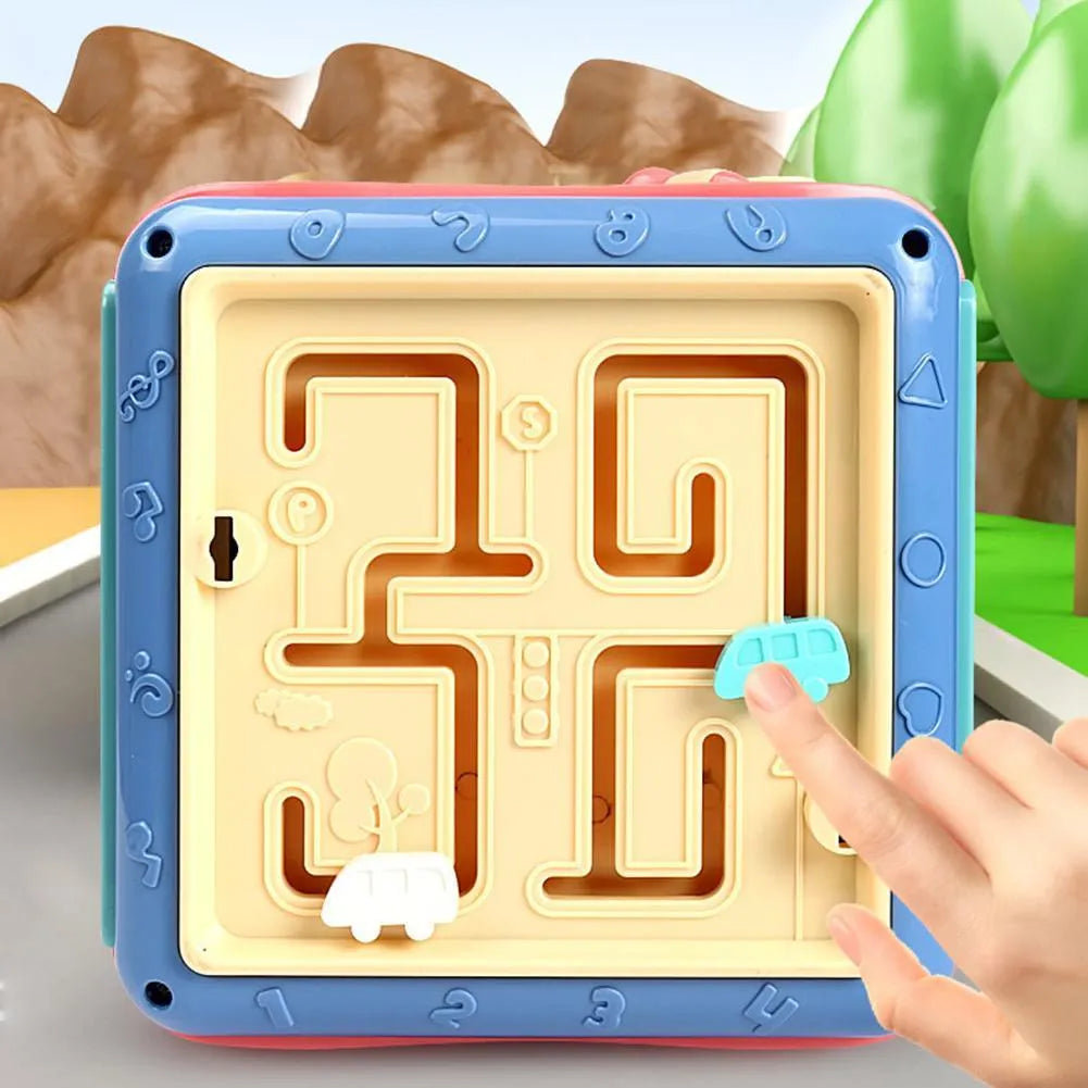 Baby hexahedron educational cube showing six sides with bead maze, clock, number tray, gears, car track, and butterfly activities