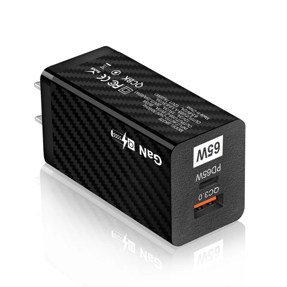 65W Gallium Nitride laptop charger in black with compact rectangular design showing USB+PD port