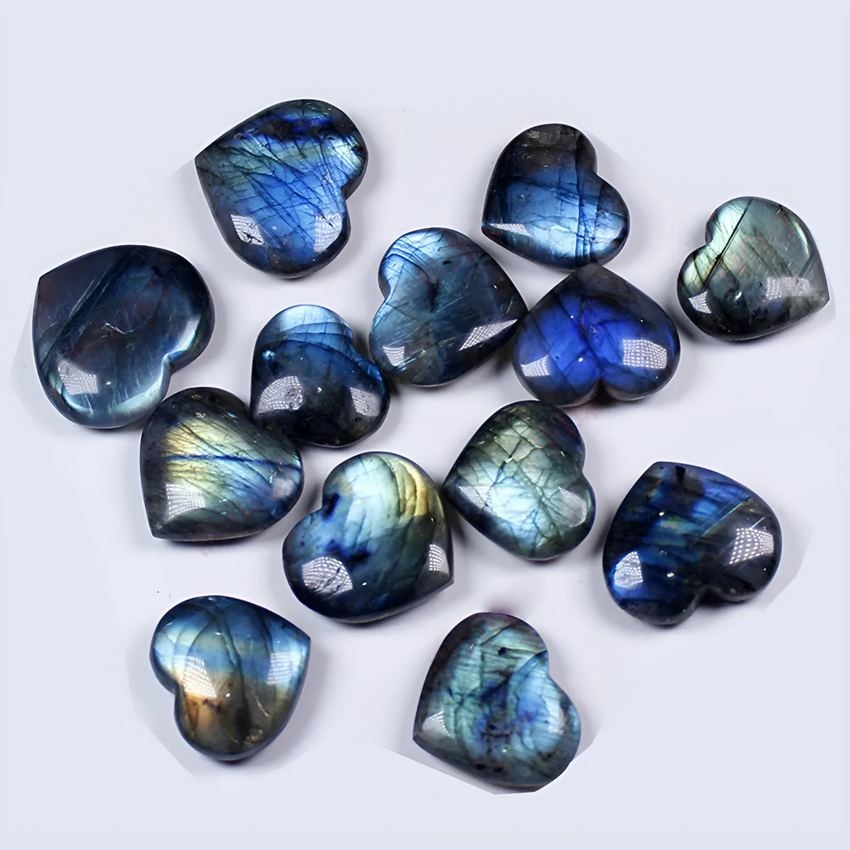 Natural blue pulled feldspar pendant with a geometric heart-shaped handle design on a white background.