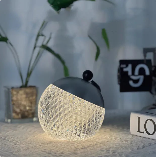 Portable dimmable desk lamp with modern minimalist design in chrome finish
