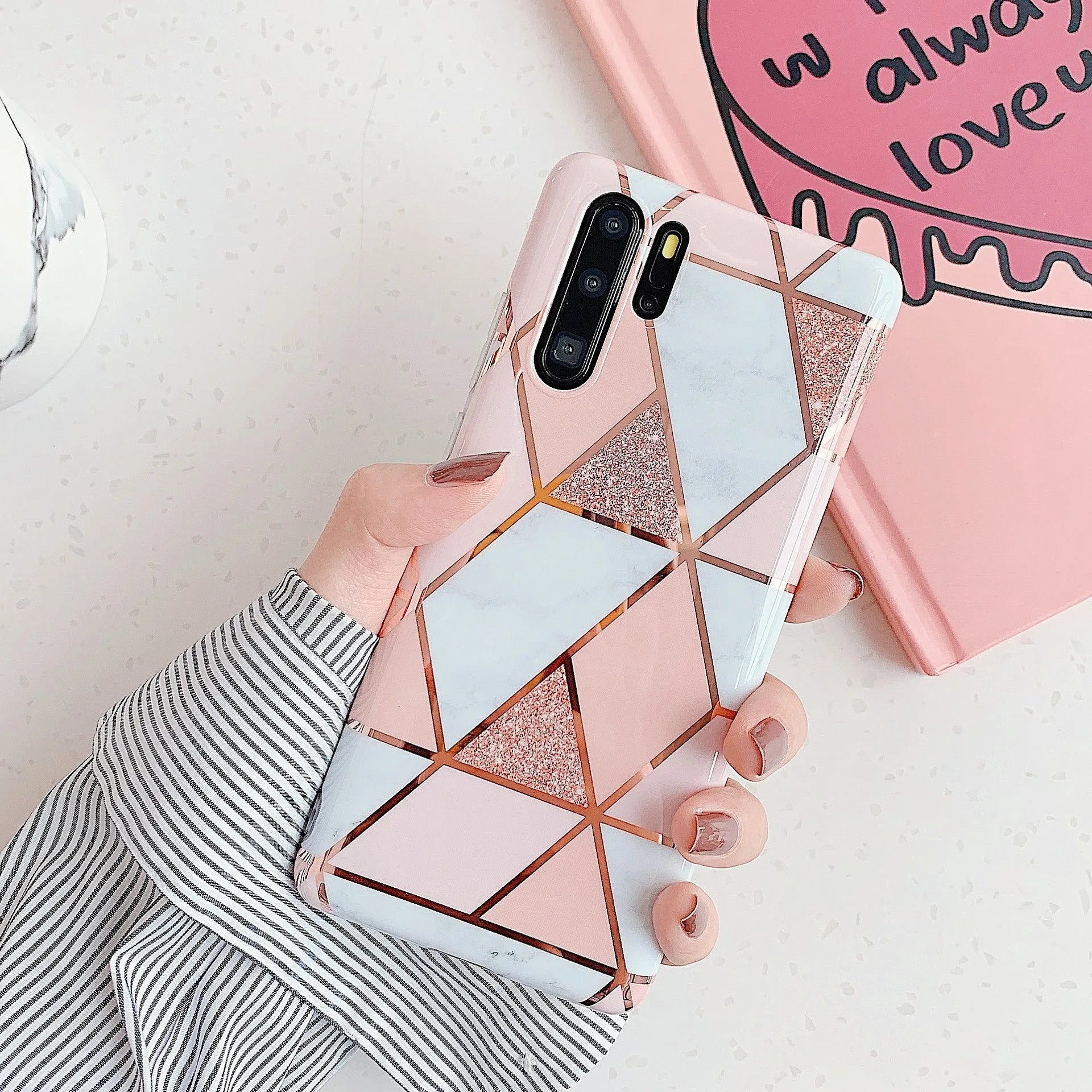 Electroplated marble finish mobile phone case for Huawei and Samsung smartphones in various colours.