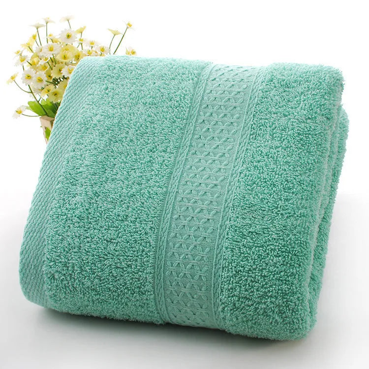 Thickened cotton blend bath and beach towel in apple green, dark blue, dark green, emerald green, light brown, or light pink.