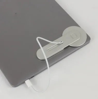 Black aluminium magnetic desktop bracket for Apple MacBook laptop storage