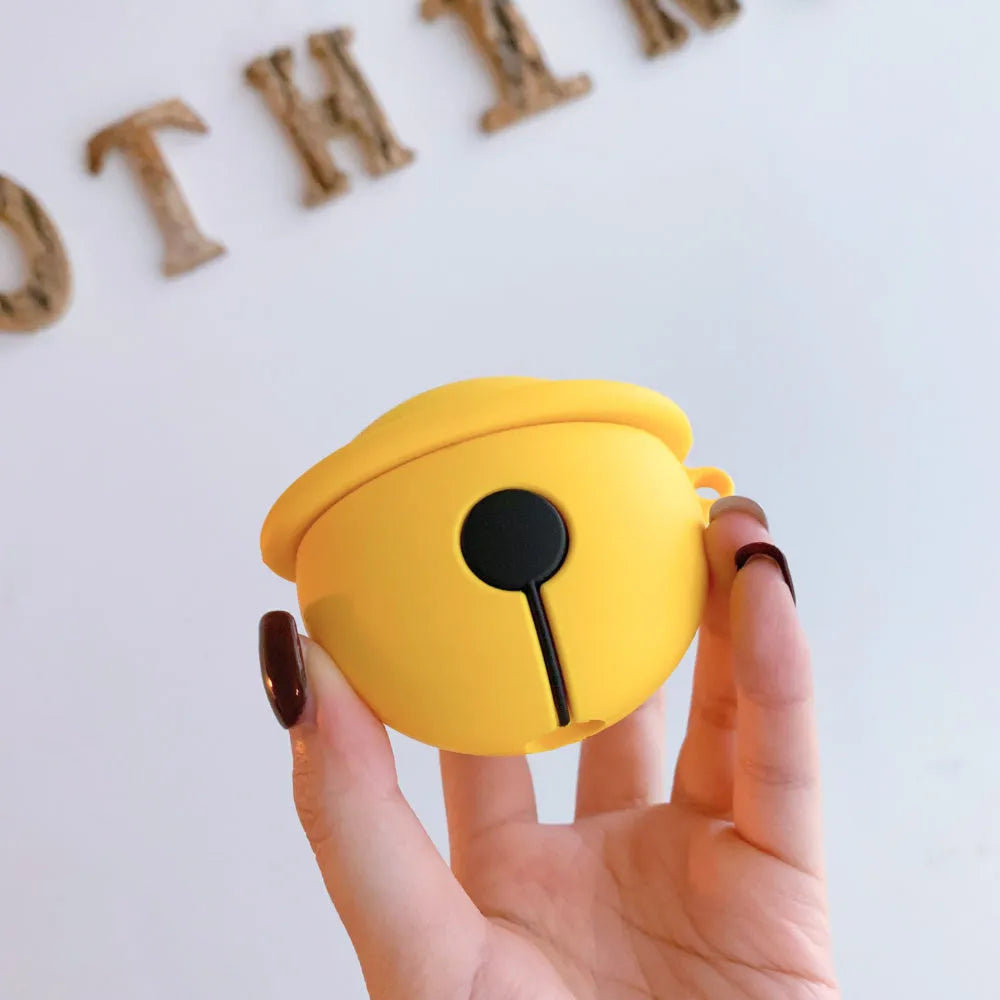 Yellow silicone AirPods case with a small silver bell charm attached