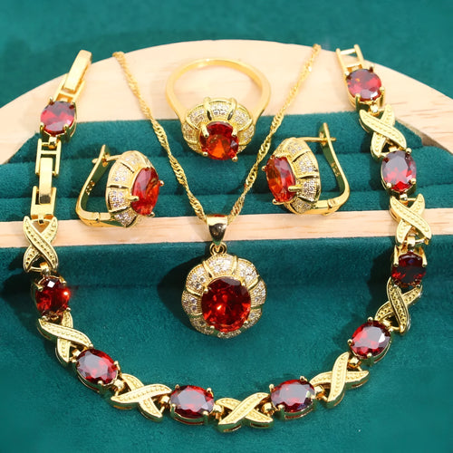 18k gold plated cubic zirconia jewellery set showing necklace, earrings, ring and bracelet in four colour options