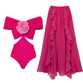 Women's floral hollow-out one-piece swimsuit with a matching skirt on a mannequin.