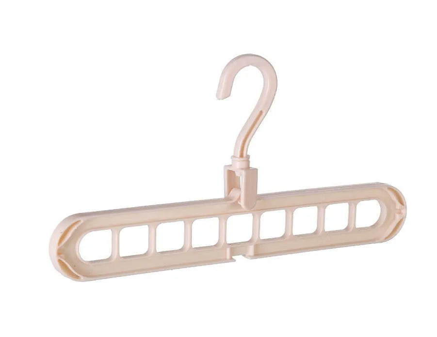 Pink plastic clothes hanger with a 360-degree rotating hook on a white background.