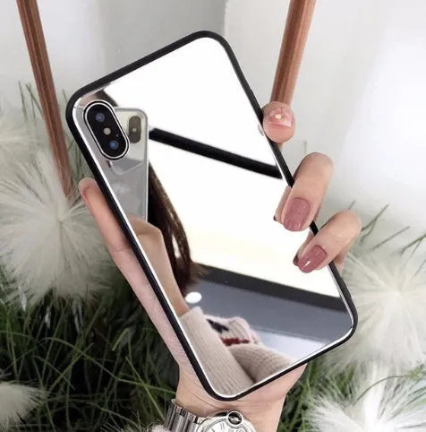 Black iPhone mirror phone case showing reflective surface, compatible with iPhone X and 7/8 Plus models.