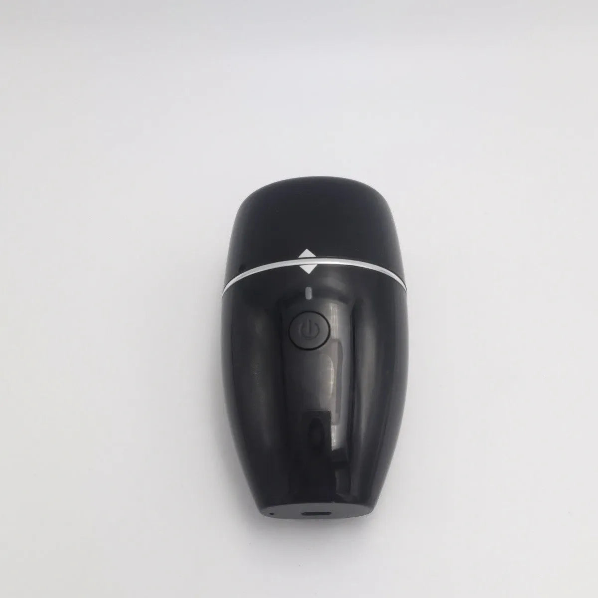 Black and white electric lip plumper device with silicone tip and USB charging cable