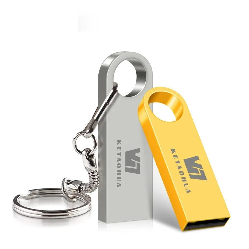Metal car-shaped USB flash drive in silver finish showing detailed automotive design and USB connector
