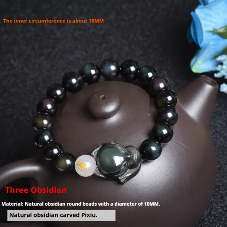 Natural black obsidian bracelet with 10mm beads and zodiac design in gold, silver, or pure stone variations