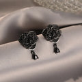 Black rose stud earrings with floral zircon design and gold-coloured electroplating