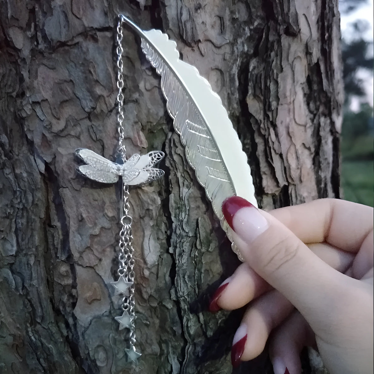 Luminous retro pure copper feather bookmark with silver finish and glow-in-the-dark butterfly design